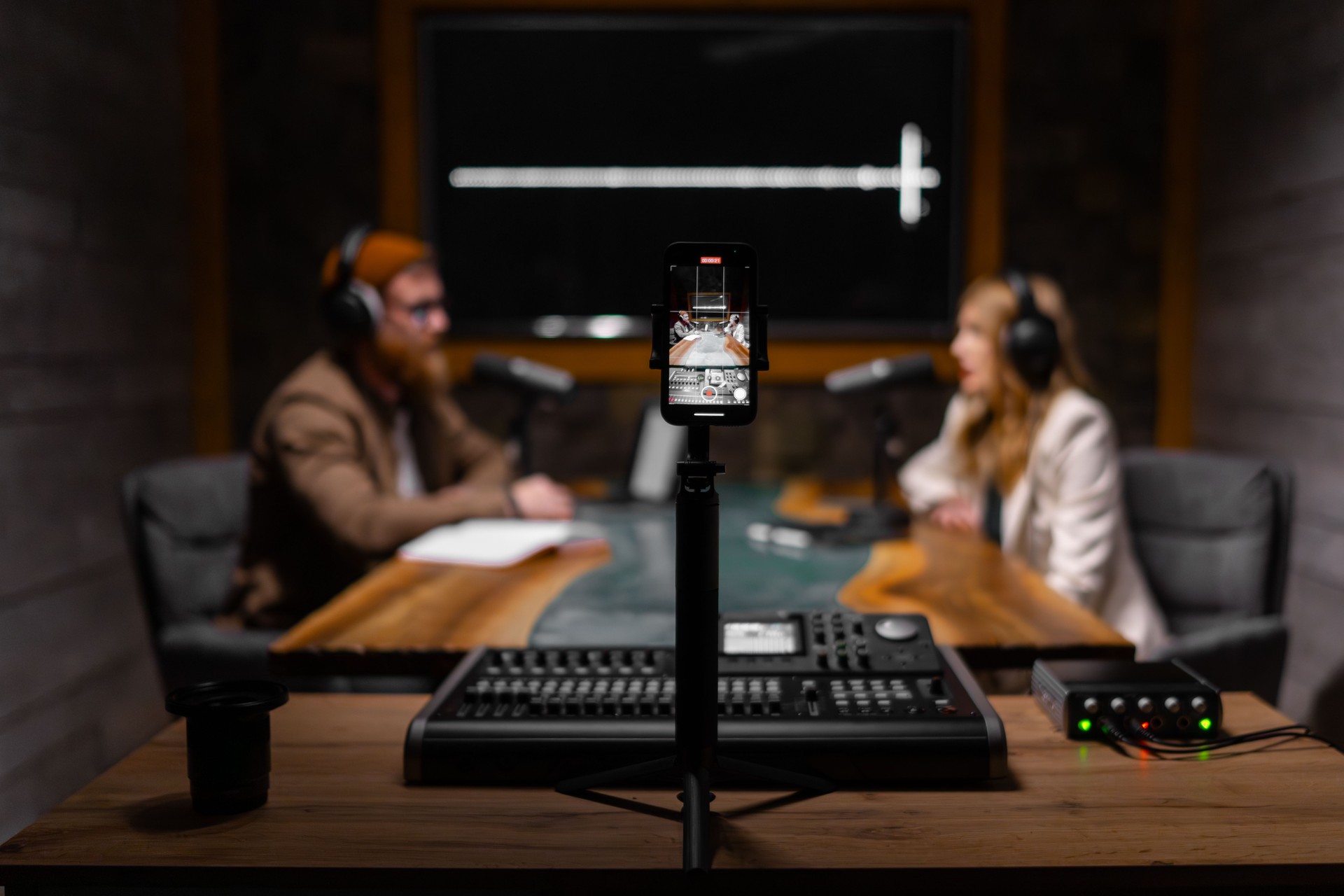 Professional podcast recording in modern studio with quality equipment for online broadcasting